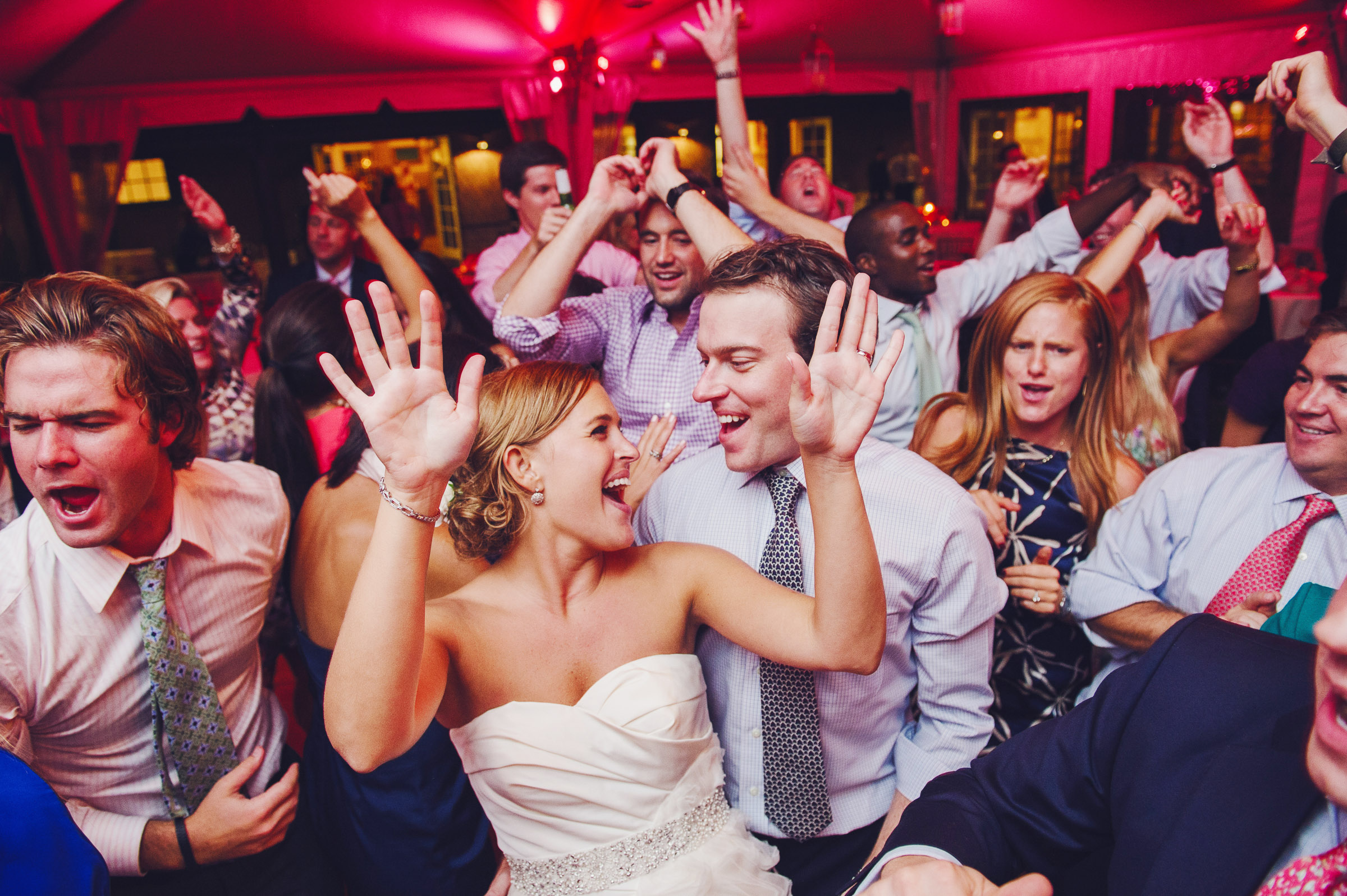 The bride and groom show off their own unique dance moves